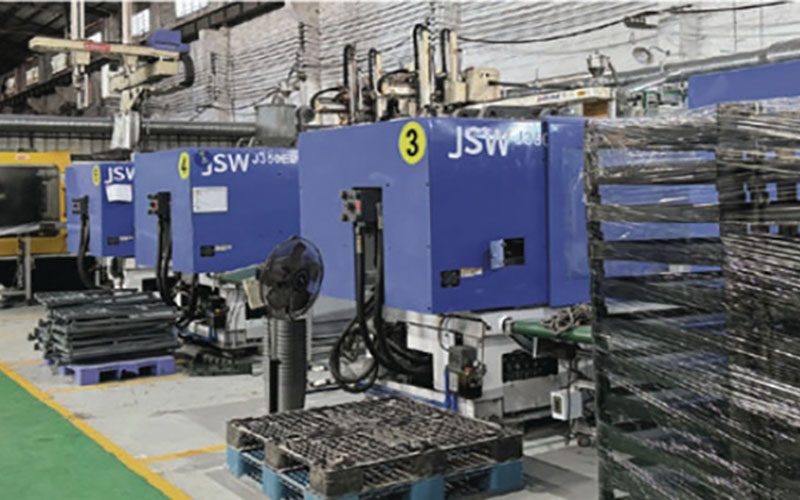 close-up of JSW plastic injection molding machine